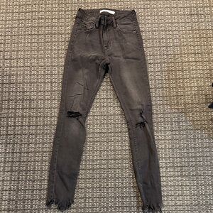 Black Distressed Skinny Jeans. Size 24